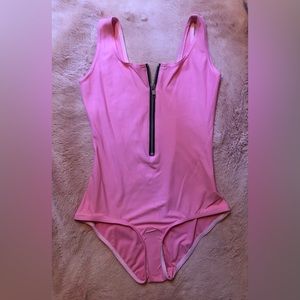 Blackmilk - Matte pink zip up body suit